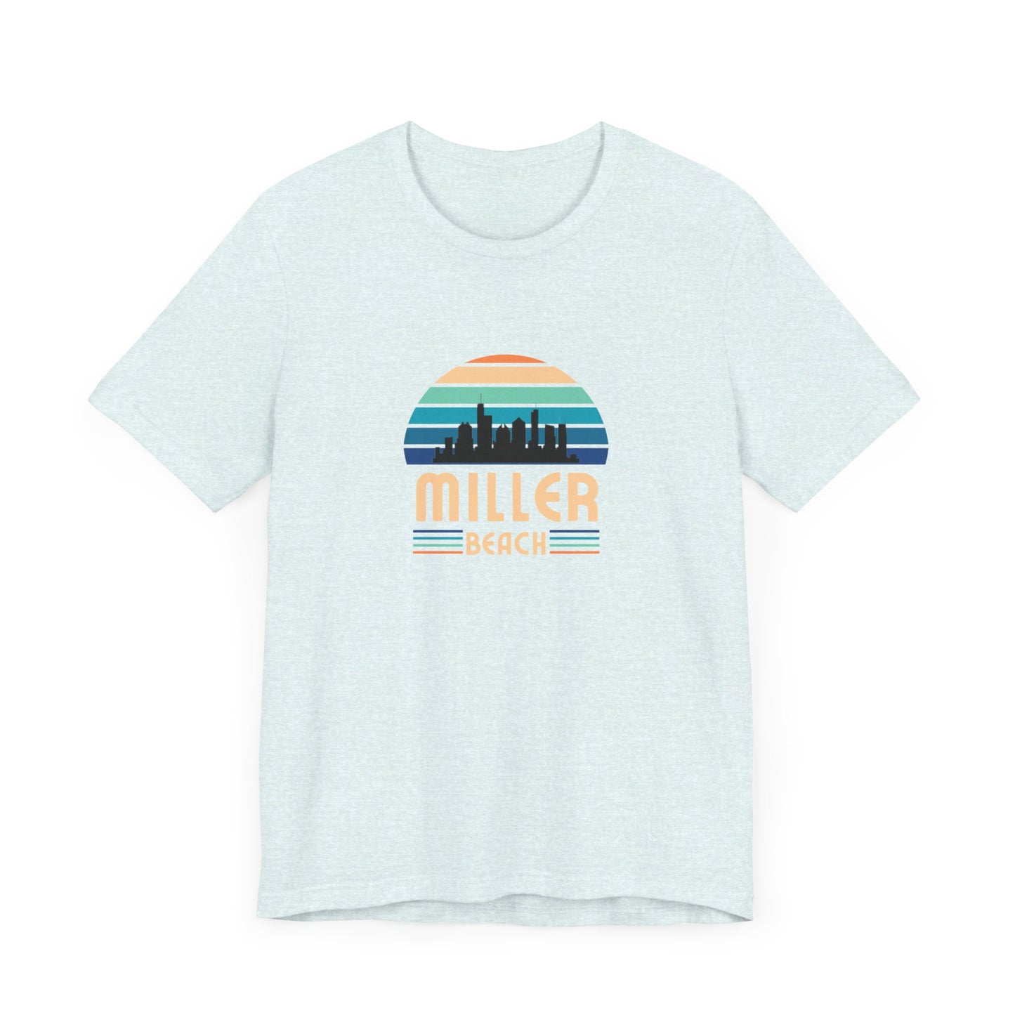 The Printify Miller Beach Chicago Skyline - Unisex Jersey Short Sleeve Tee is a light blue T-shirt featuring a stylized graphic of the Chicago skyline against a setting sun with gradient shades of blue and orange. Below the graphic, "Miller Beach" is printed in bold, yellow letters.