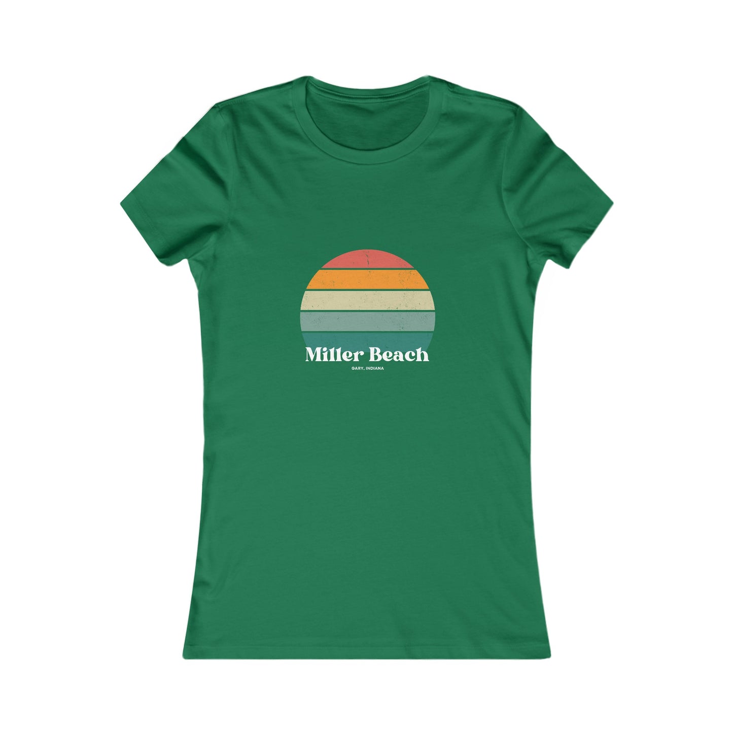 The Printify Women's Favorite Tee - Miller Beach Gary, IN Retro Sunset is a pink women's T-shirt showcasing a retro-style graphic of a sun with horizontal stripes in orange, yellow, and green. Designed with a feminine fit, the airlume combed cotton fabric offers premium softness. Below the sun, the text reads "Miller Beach" in white, with smaller text underneath that is not legible.