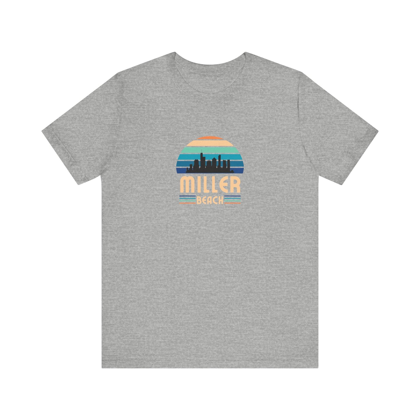 A brown unisex jersey short sleeve tee called "Miller Beach Chicago Skyline" from Printify features a vintage-style design with a sunset, the Chicago skyline, and "Miller Beach" in bold letters. The design incorporates shades of blue, orange, and yellow and is displayed against a plain white background.