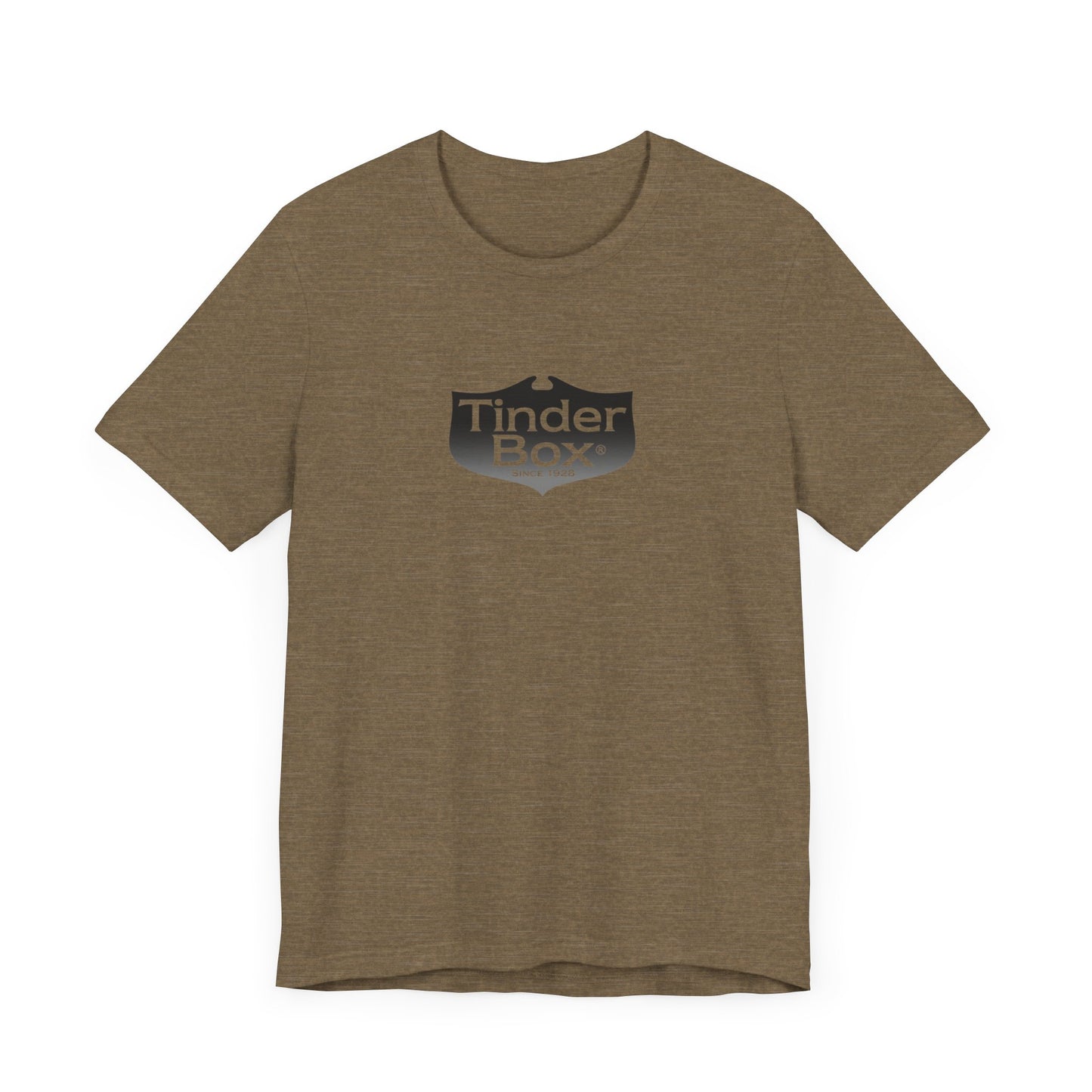 A light blue Printify "The Tinder Box 1980s" unisex jersey short sleeve tee featuring the "Tinder Box" logo in the center. The logo consists of a dark shield with the words "Tinder Box" in white text, with a small flame icon replacing the dot above the "i".