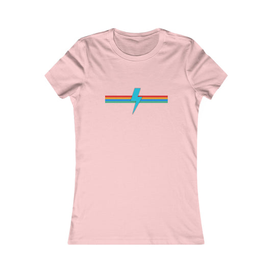 A light pink women's fitted t-shirt from Printify, called the SoCool Shirts OG Logo Retro - Women's Favorite Tee, showcases a minimalist design featuring a blue lightning bolt logo slicing through a horizontal tricolor stripe in red, orange, and teal across the chest area. The shirt boasts short sleeves, a round neckline, and is made from soft Bella + Canvas fabric.