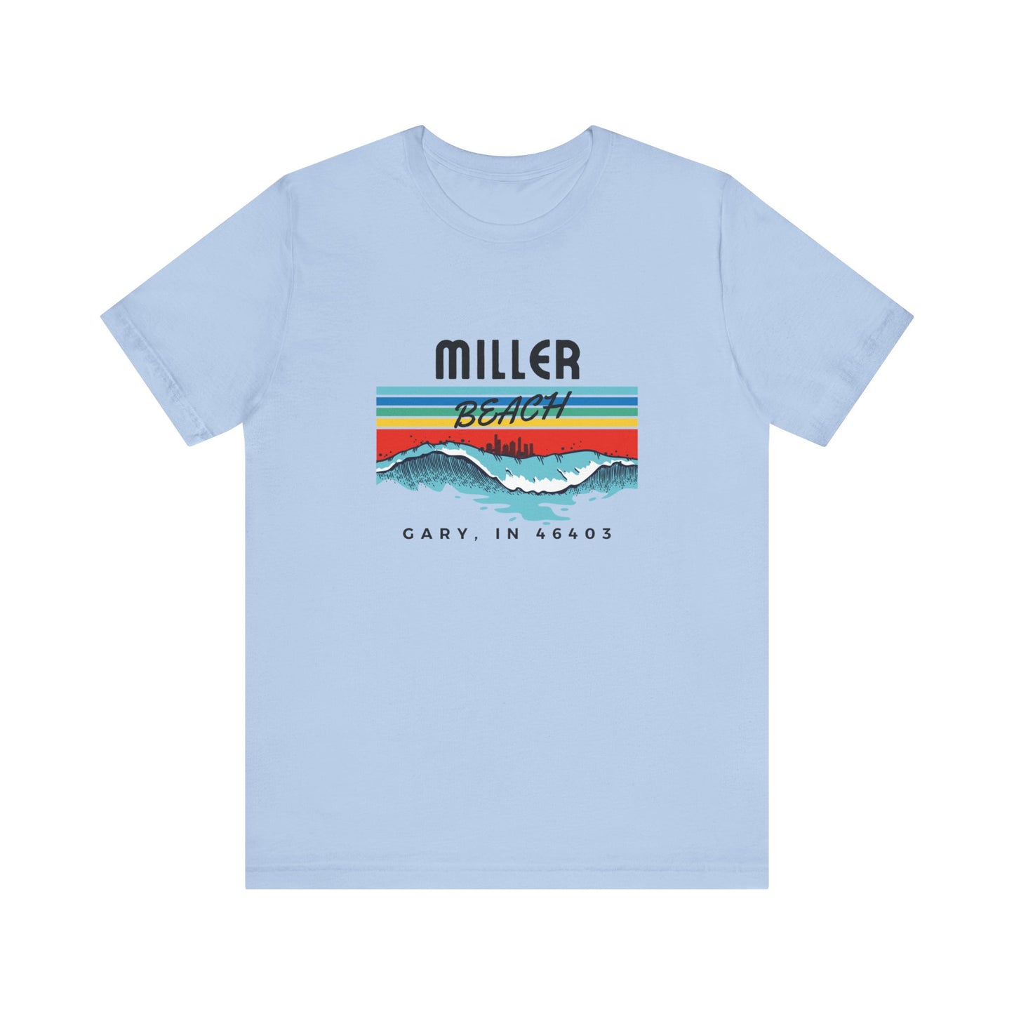 The Miller Beach 46403 Surf Style - Unisex Jersey Short Sleeve Tee by Printify features a retro surf-inspired design on a yellow background. The shirt displays "MILLER BEACH" above waves with a skyline illustration, while "Cary, IN 46403" is printed below the waves. The vibrant design also includes colorful stripes in shades of blue, red, and orange.