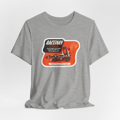 The 1970's Raceway Park - Blue Island, IL - Unisex Jersey Short Sleeve Tee by Printify is a light gray T-shirt featuring a graphic with a red background, an illustration of a race car labeled "17," and text reading "RACEWAY" and "As Seen On." The vintage-inspired design offers a nostalgic nod to classic car enthusiasts, reminiscent of the '70s racing era. The shirt is displayed against a plain background.