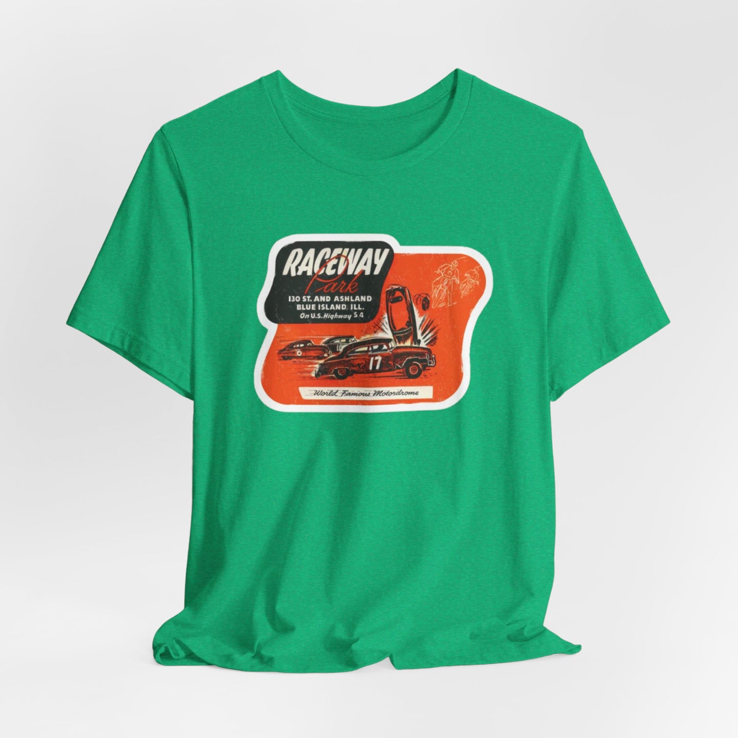 The 1970's Raceway Park - Blue Island, IL - Unisex Jersey Short Sleeve Tee by Printify is a light gray T-shirt featuring a graphic with a red background, an illustration of a race car labeled "17," and text reading "RACEWAY" and "As Seen On." The vintage-inspired design offers a nostalgic nod to classic car enthusiasts, reminiscent of the '70s racing era. The shirt is displayed against a plain background.