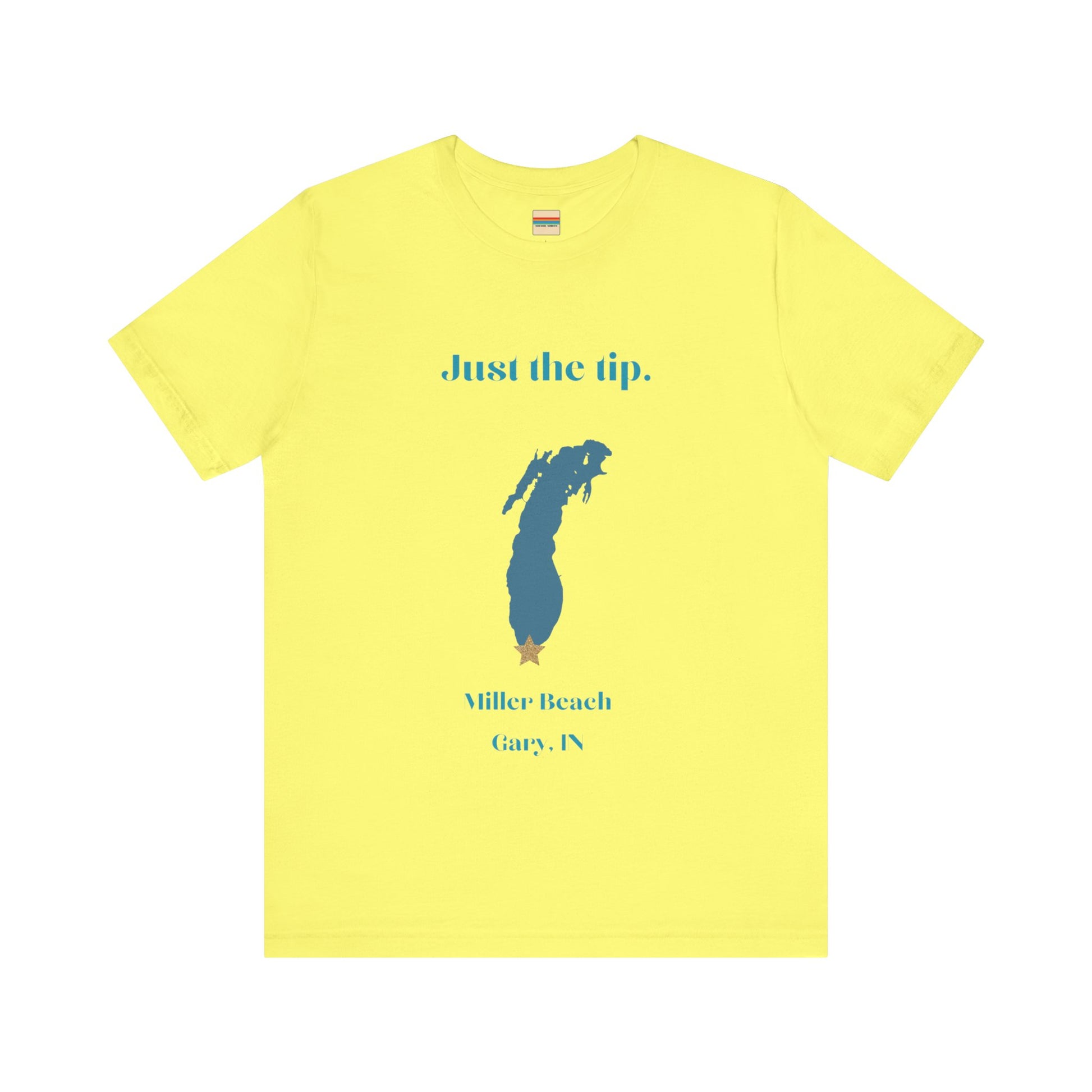 The Just the Tip - Miller Beach Unisex Jersey Short Sleeve Tee by Printify in yellow showcases text and a graphic design. The top displays "Just the tip" above a blue silhouette reminiscent of Indiana. At the bottom, it reads "Miller Beach" and "Gary, IN." Made from soft Airlume combed cotton, this tee offers both comfort and style.