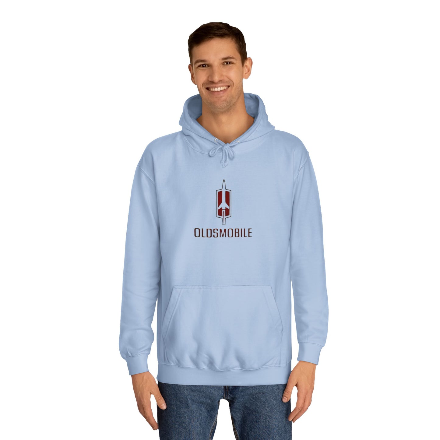 The Oldsmobile 1970s Logo - Unisex College Hoodie by Printify offers a cozy fit in white, featuring a red and black Oldsmobile logo on the front with a stylized rocket above "OLDSMOBILE." It includes a kangaroo pocket and drawstring hood for classic comfort.