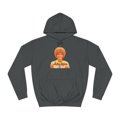 This Helen Roper - Three's Company unisex hoodie by Printify features a lively graphic of a woman with curly hair in a vibrant, patterned outfit. The elegantly scripted text "Mother Rogers" beneath her adds a vintage fashion flair to any wardrobe.