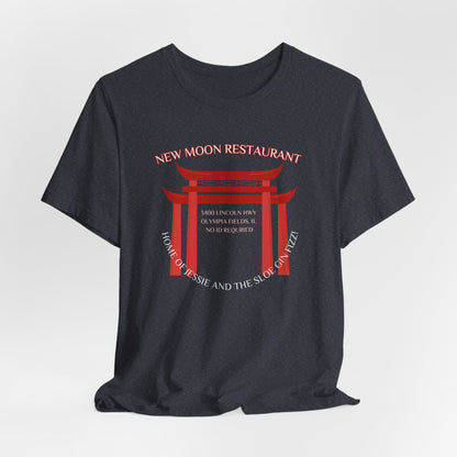 The New Moon Restaurant - Olympia Fields 1980s Retro Unisex Jersey Short Sleeve Tee by Printify is a nostalgic black jersey that features a red torii gate graphic with the text "New Moon Restaurant" at the top. Below the gate, it reads "Home of Tessie and the Slo Poke Mai Tai," along with the address "8400 Lincoln Blvd, Olympia Fields, IL.