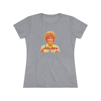 A Women's Triblend Tee by Printify, titled "Helen Roper - Three's Company," features a red design with an illustration of a smiling person with curly hair and colorful clothing. Below the illustration, the text "Helen Roper" is written in a bold, retro font, capturing the essence of vintage TV humor.