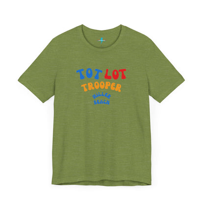 A green unisex jersey short sleeve tee from Printify, featuring colorful text on the front that reads "TOT LOT TROOPER MILLER BEACH" in blue, red, yellow, and orange letters. The shirt is displayed against a plain white background.