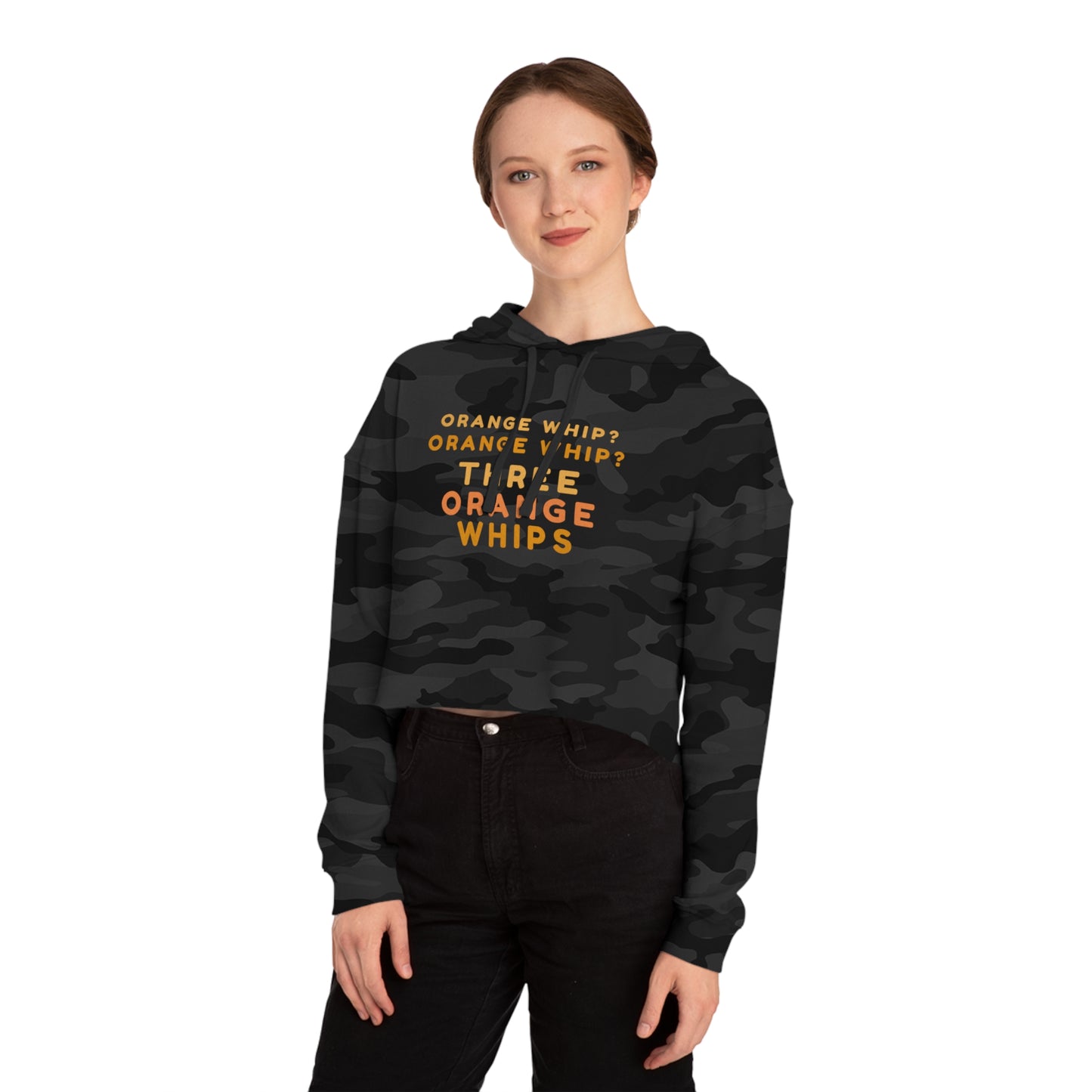 A stylish and comfortable Black Camo cropped hooded sweatshirt from Printify, this "Three Orange Whips - Blues Brothers" women's hoodie features the iconic text "Orange Whip? Orange Whip? Orange Whip? THREE ORANGE WHIPS" in bright orange letters on the front. It includes a front pocket and drawstring-adjustable hood.