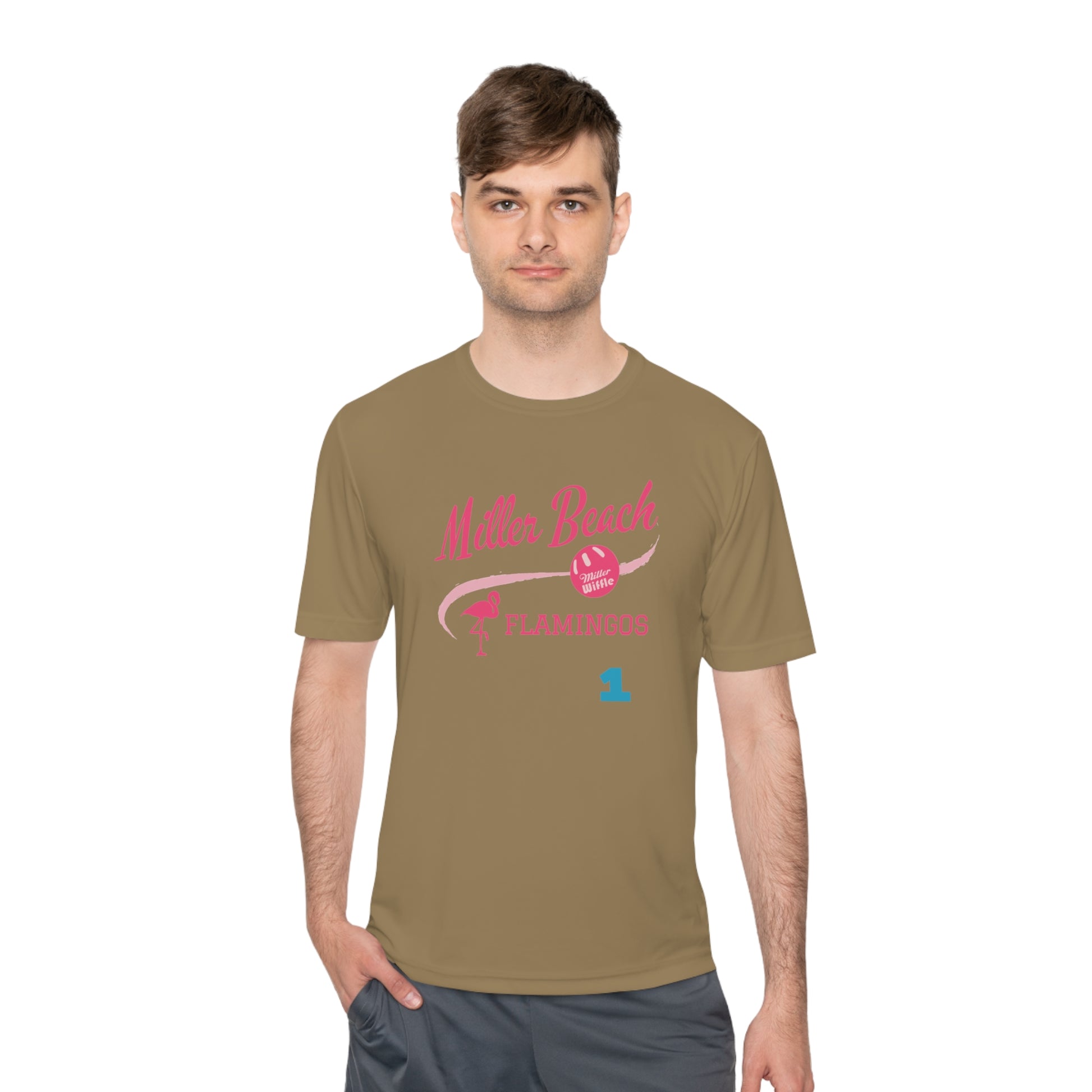 Introducing the "Miller Beach Flamingos - Jackson 01" Unisex Moisture Wicking Tee by Printify. This beige T-shirt showcases "Miller Beach" in a pink cursive font accompanied by a small pink flamingo illustration. Below, "FLAMINGOS" is displayed in bold pink capital letters, with a blue "01" on the bottom right corner. As part of the Sport-Tek PosiCharge Competitor collection, this lightweight shirt provides superior moisture-wicking performance.