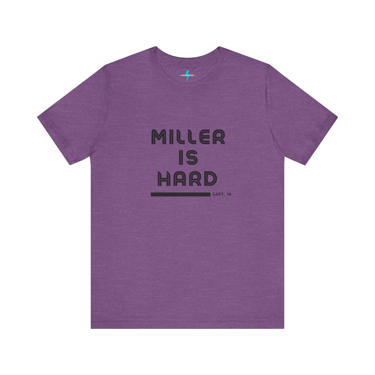 A unisex jersey short sleeve tee from Printify in burnt orange features the bold black text "MILLER IS HARD" on the chest, with "GARY, IN" written beneath in smaller black font. Perfect for showcasing Miller Beach's iconic spirit, this t-shirt is displayed against a plain white background.