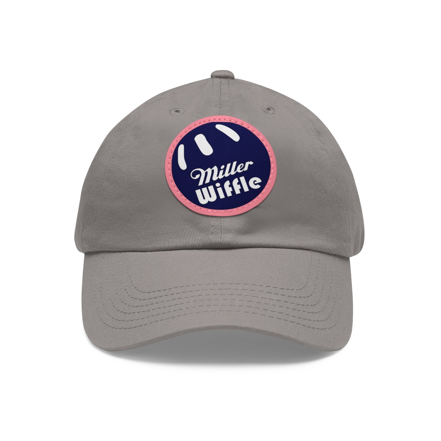 A gray dad hat by Printify, crafted from bio-washed chino twill, featuring a circular blue and white leather patch on the front. The patch showcases a baseball design with "Miller Wiffle" written in cursive font.