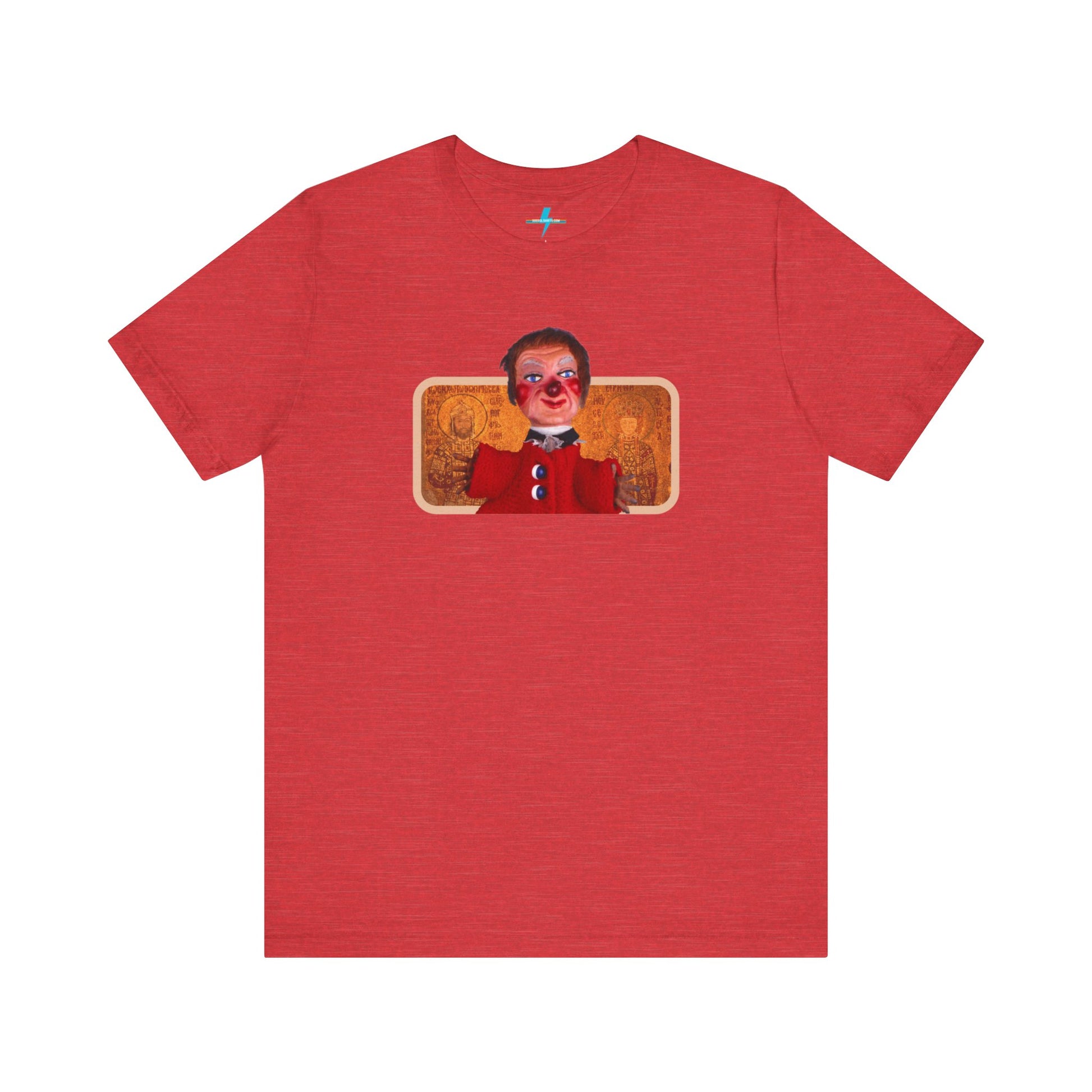 The rust-colored Printify Lady Elaine - Mr. Rogers Unisex Jersey Short Sleeve Tee features a detailed image of the Lady Elaine puppet, dressed in a red outfit with a painted face, set against an intricate artistic backdrop. The centrally positioned puppet and vivid colors create a striking contrast against the muted tone of the shirt, evoking nostalgic memories of Mr. Rogers' Neighborhood.