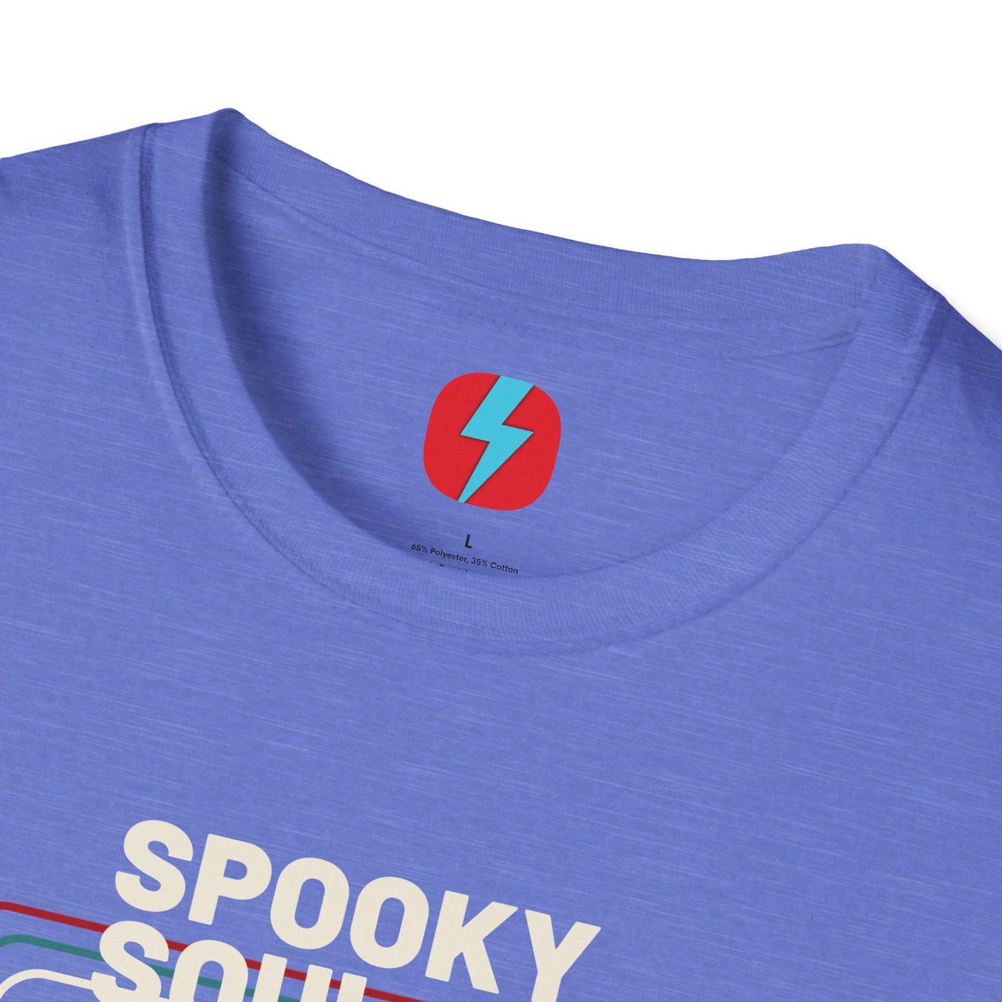 The Spooky Soul - Halloween - Unisex Softstyle T-Shirt by Printify, available in dark gray, showcases a retro-style graphic of a mummy dancing with two kids in Halloween costumes. The text "SPOOKY SOUL" is displayed above the image, which is framed by red and blue lines to enhance its vintage feel.