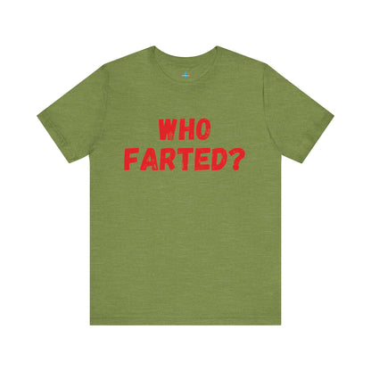 A white unisex jersey short sleeve tee from Printify featuring bold red text in the center that reads "WHO FARTED?". The distressed font style gives the text a touch of 80s comedy, inspired by the iconic 'Who Farted? Booger’ tee from Revenge of the Nerds.