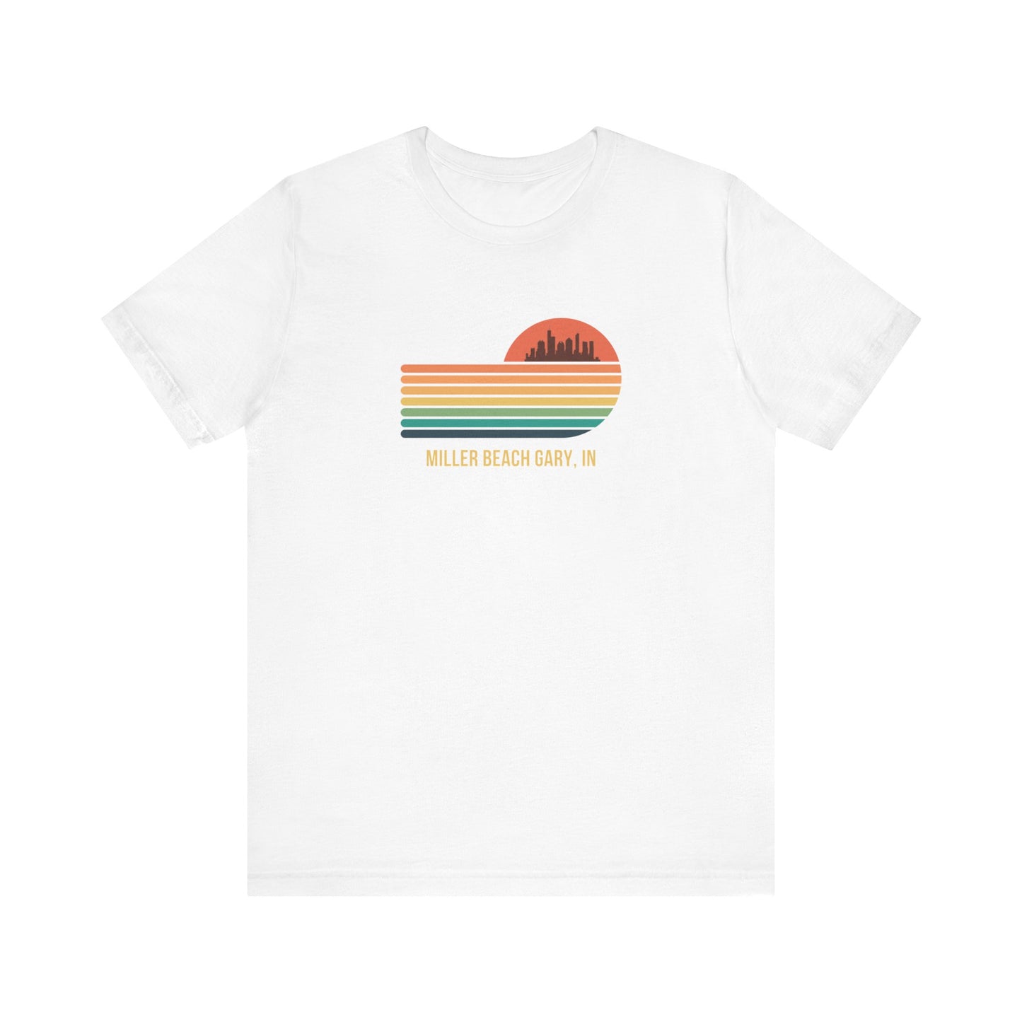 Introducing the Miller Beach Gary, IN Sunset Gradient - Unisex Jersey Short Sleeve Tee by Printify. This stylish blue T-shirt features a circular sunset graphic on the chest, showcasing a black city skyline silhouette against an orange-red sunset with horizontal stripes in green, yellow, and orange. Below the graphic reads "MILLER BEACH GARY, IN." Crafted from soft cotton for extra beachy charm.