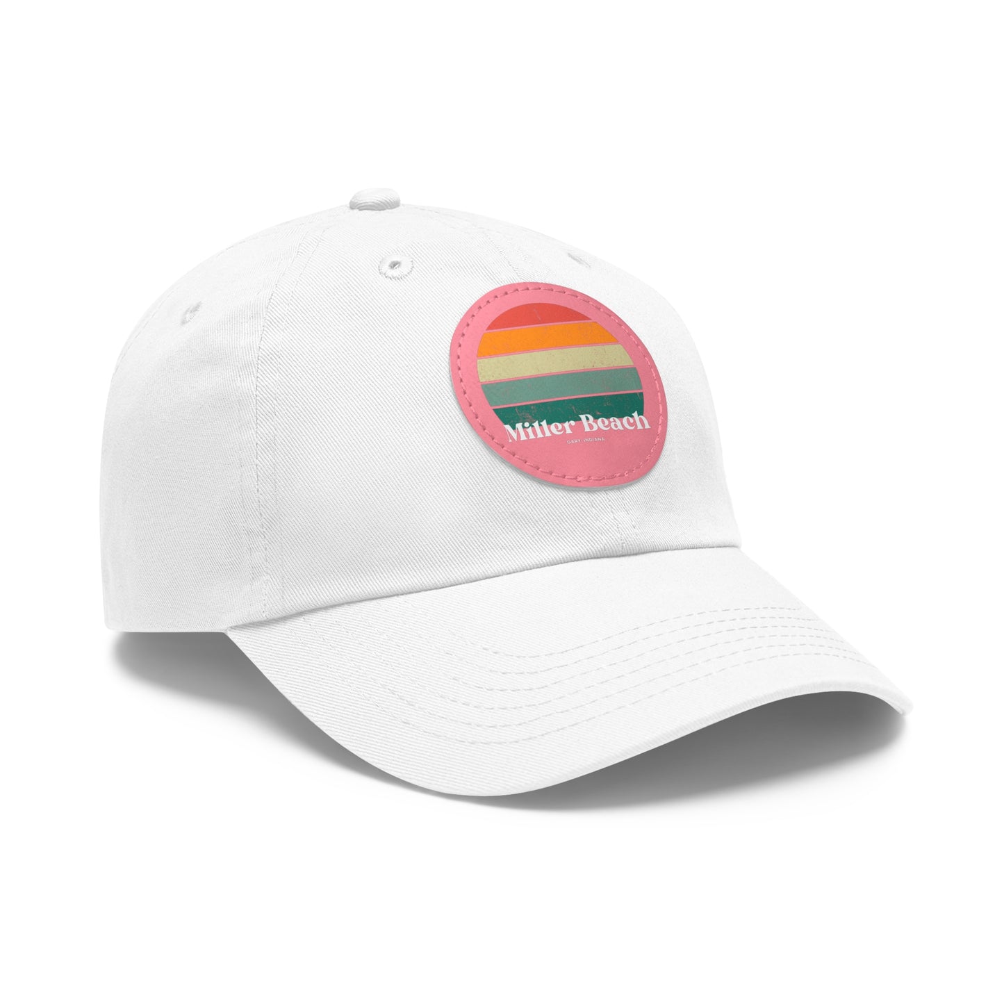 The Miller Beach Retro Sunset - Dad Hat with Leather Patch (Round) by Printify is a pink baseball cap crafted from bio-washed chino twill for added comfort. It features a PU leather patch adorned with horizontal stripes in red, orange, yellow, green, and blue. Below the stripes, "Miller Beach" is embroidered in white. An adjustable strap at the back ensures a perfect fit.