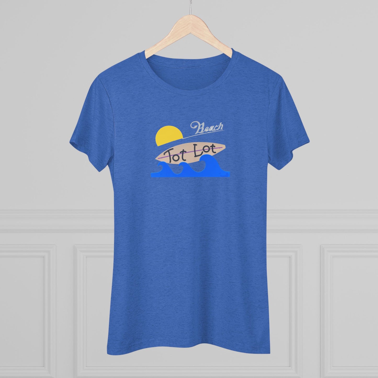 Introducing the Tot Lot Full Sign - Miller Beach - Women's Triblend Tee by Printify! This stylish gray t-shirt features a vintage-inspired design showcasing a setting sun, a surging blue wave, and the phrase "Miller Beach Tot Lot" in eye-catching stylized fonts. Perfect for any casual outing, this beach-themed top exudes a playful and trendy vibe.