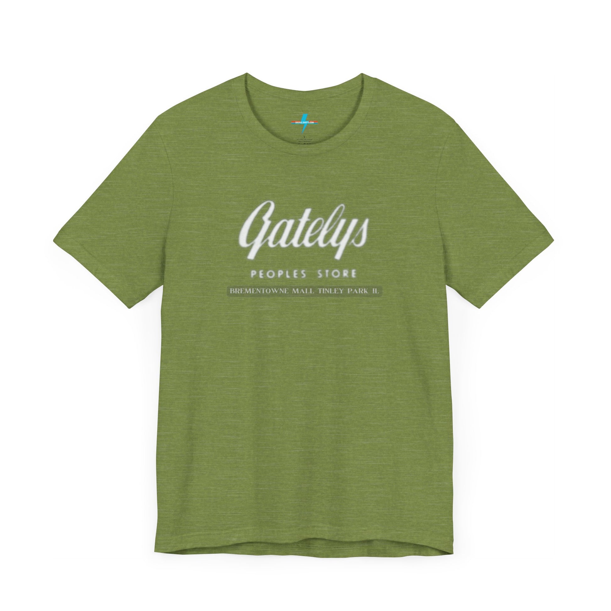 A green unisex jersey short sleeve tee from Printify's SoCool Shirts collection, featuring "Gately's People's Store" printed prominently in white on the front. Below this, smaller text reads "Tinley Park's Brementowne Mall" in white. The T-shirt is displayed against a plain white background and is named the "Gatelys Peoples Store - Vintage 1980s.