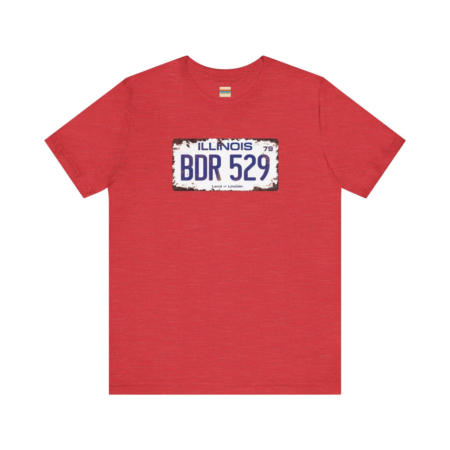 The Printify Blues Brothers BDR 529 License Plate Unisex Jersey Short Sleeve Tee showcases a vintage Illinois license plate graphic with "BDR 529" prominently displayed, as famously seen in the Blues Brothers film. The design includes "Illinois" and "Land of Lincoln" above and below the numbers, with a weathered, rustic look that enhances its retro appeal.