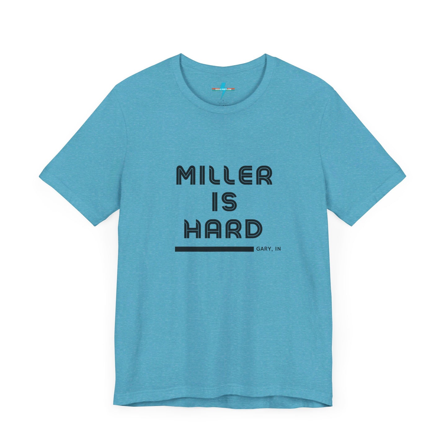 A unisex jersey short sleeve tee from Printify in burnt orange features the bold black text "MILLER IS HARD" on the chest, with "GARY, IN" written beneath in smaller black font. Perfect for showcasing Miller Beach's iconic spirit, this t-shirt is displayed against a plain white background.