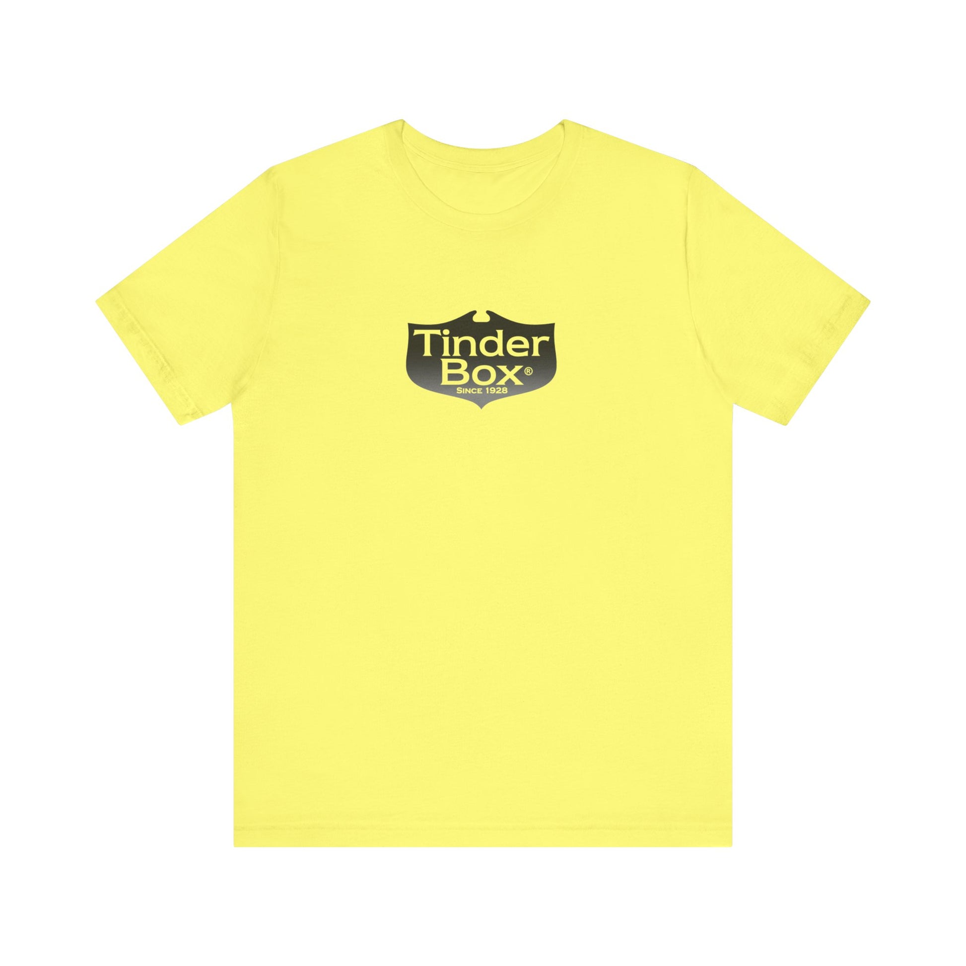 A light blue Printify "The Tinder Box 1980s" unisex jersey short sleeve tee featuring the "Tinder Box" logo in the center. The logo consists of a dark shield with the words "Tinder Box" in white text, with a small flame icon replacing the dot above the "i".