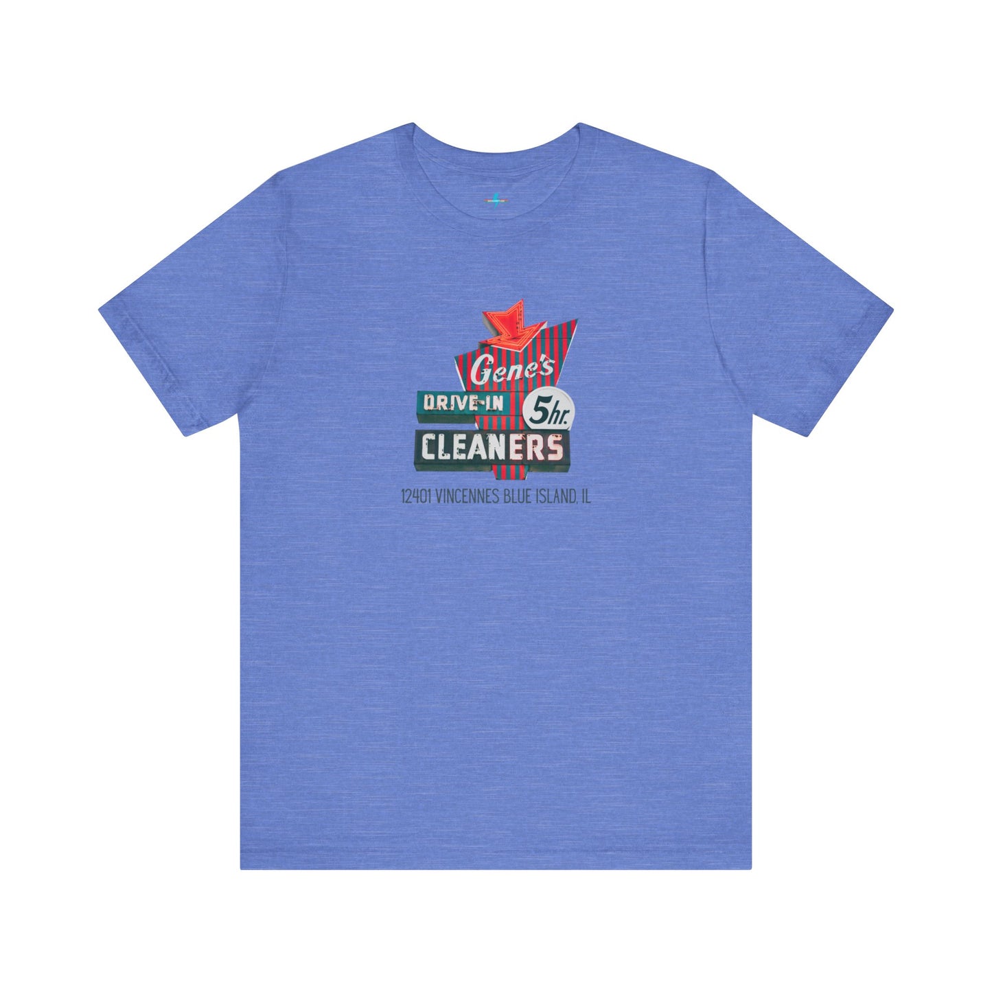 A unisex Jersey short sleeve tee from Printify featuring a light grey color with a retro-style graphic in the center. The design showcases text that reads "Gene's Drive In Cleaners, 5th," along with the address "12401 Vincennes Blue Island IL" in a blend of vintage fonts and colors, evoking the classic Chicago Fire-era vintage sign aesthetic.