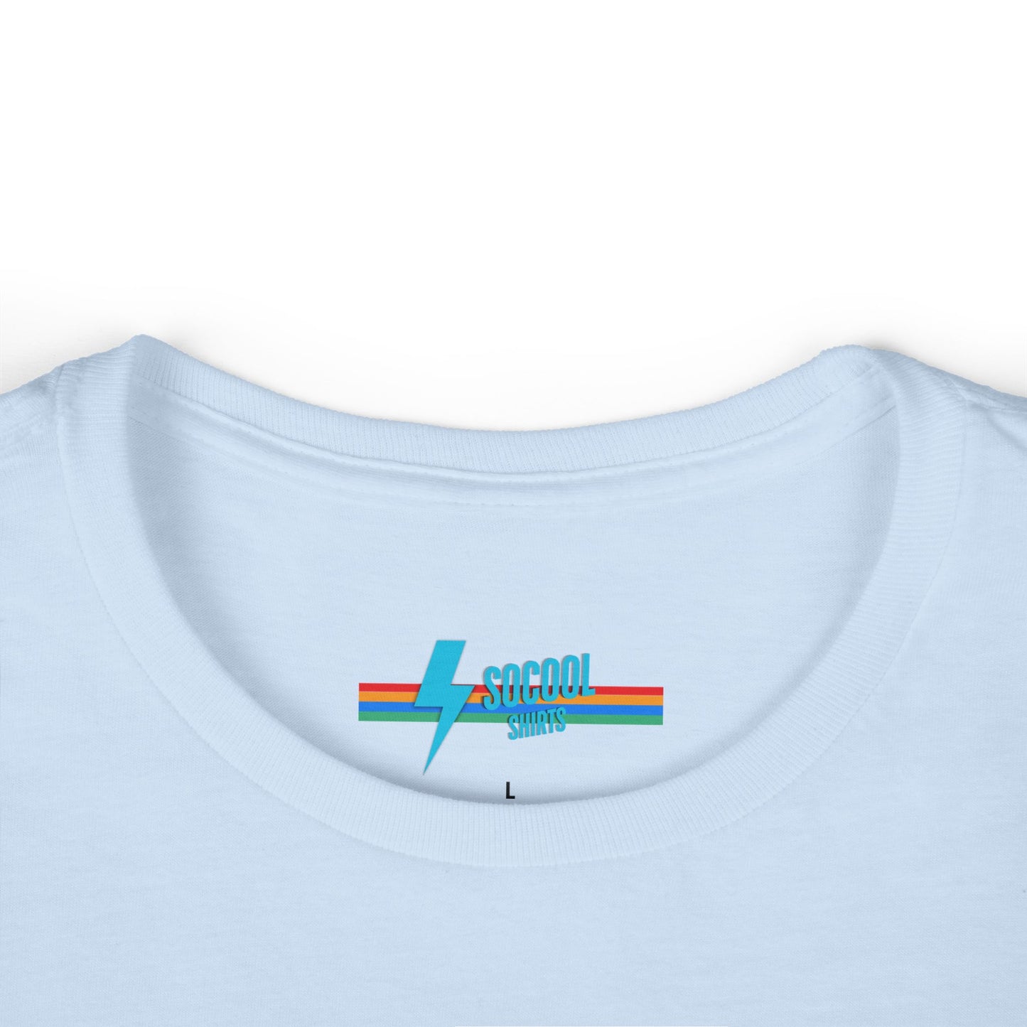 The Printify Just the Tip - Miller Beach Women's Softstyle Tee, crafted from high-quality tri-blend fabric, showcases a light blue color with a stylized wave graphic alongside the text "Just the tip. Miller Beach, Gary, IN." This tee is both casual and stylish, making it an ideal choice to express your beachside spirit.