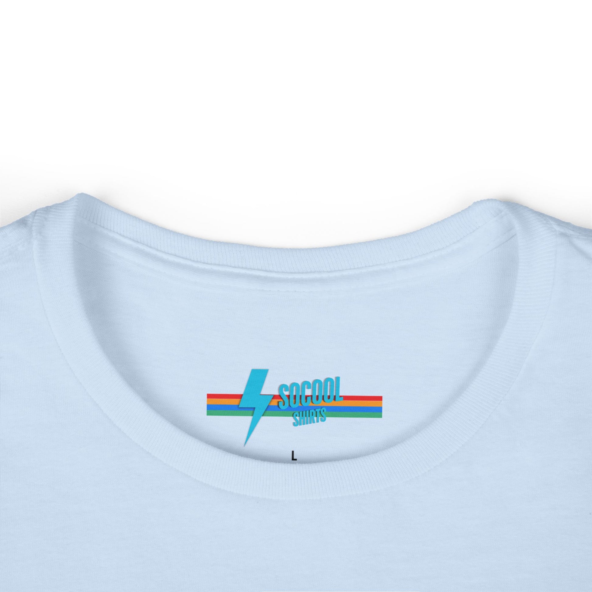 The Printify Just the Tip - Miller Beach Women's Softstyle Tee, crafted from high-quality tri-blend fabric, showcases a light blue color with a stylized wave graphic alongside the text "Just the tip. Miller Beach, Gary, IN." This tee is both casual and stylish, making it an ideal choice to express your beachside spirit.