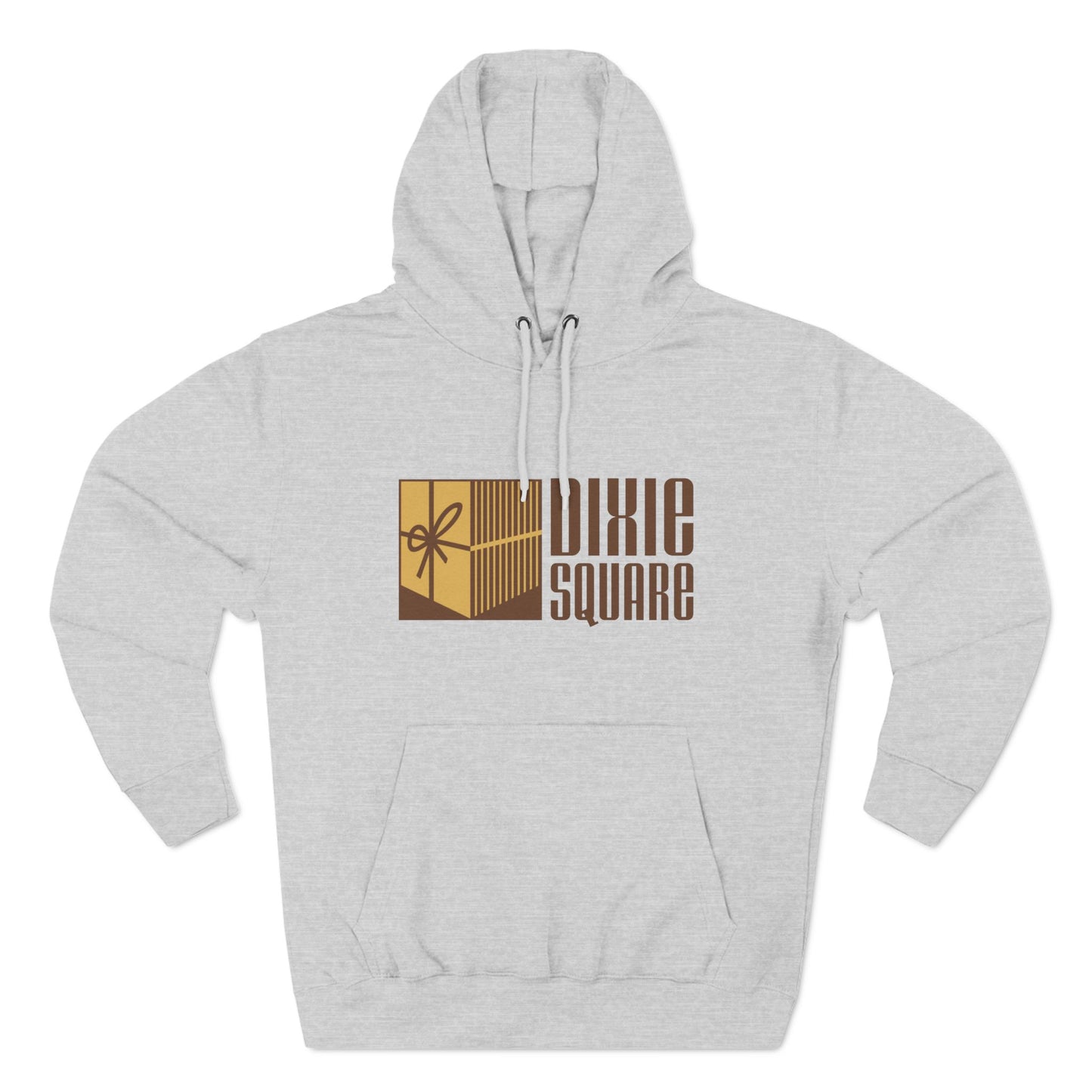 A black hoodie from Printify, named "Dixie Square 1960s Logo - Harvey, IL - Three-Panel Fleece Hoodie," featuring the words "Dixie Square" in brown stylized block letters on the front. Embracing a retro charm, the design also includes a graphic of a gold-colored square with a scissors icon and vertical lines, reminiscent of Dixie Square Mall's heyday.