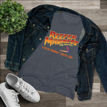 This limited-edition dark gray "Reefer Madness Cast Shirt - Miller Community Theatre - Women's Triblend Tee" by Printify features the text "Reefer Madness: The Musical" in bold, fiery letters across the chest. Below, in smaller orange text, it reads, "A Hill's Community Theatre Joint.