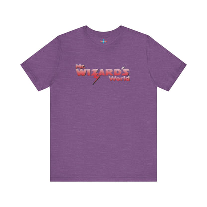 A purple Mr. Wizard's World T-shirt from Printify, featuring bold gradient red and white text with a lightning bolt through the letter "A" in "Wizard." Ideal for science enthusiasts and fans of the iconic 1980s Nickelodeon show, this unisex jersey short sleeve tee is displayed against a plain white background.