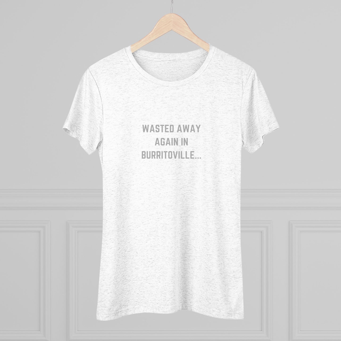 The Women's Triblend Tee from Printify, named "Wasted Away Again in Burritoville," is a dark gray heather vintage t-shirt featuring short sleeves and a crew neck. The front showcases the text "WASTED AWAY AGAIN IN BURRITOVILLE..." printed in white capital letters. This nostalgic piece from the 1980s is neatly displayed on a flat surface against a white background.