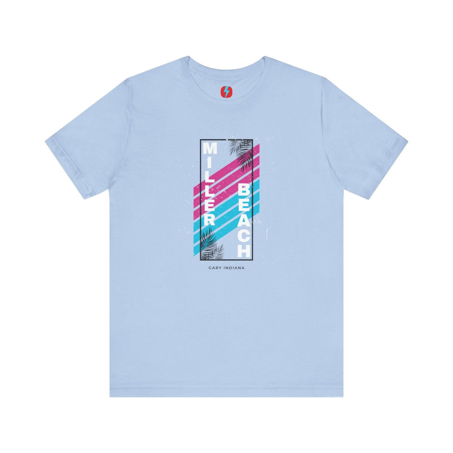 The Printify Miller Beach 1980s Style Unisex Jersey Short Sleeve Tee features a light blue base with retro-inspired diagonal stripes in blue and pink. "Miller Beach" is vertically displayed in white alongside black palm leaves, with "Gary Indiana" written at the bottom.