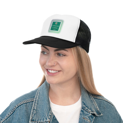 The Printify "The Lebanon Loop - Indiana" trucker cap features a green brim, mesh back, and an adjustable plastic snap closure. It showcases a blurred print of a highway sign that reads "39 Lebanon Lizton 1 mi" in white text on a green background, making it the perfect addition to your collection.