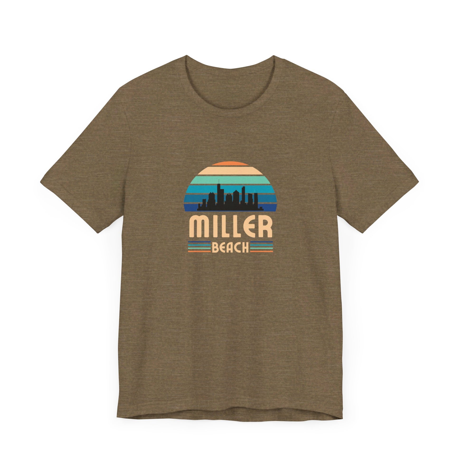 The Printify Miller Beach Chicago Skyline - Unisex Jersey Short Sleeve Tee is a light blue T-shirt featuring a stylized graphic of the Chicago skyline against a setting sun with gradient shades of blue and orange. Below the graphic, "Miller Beach" is printed in bold, yellow letters.