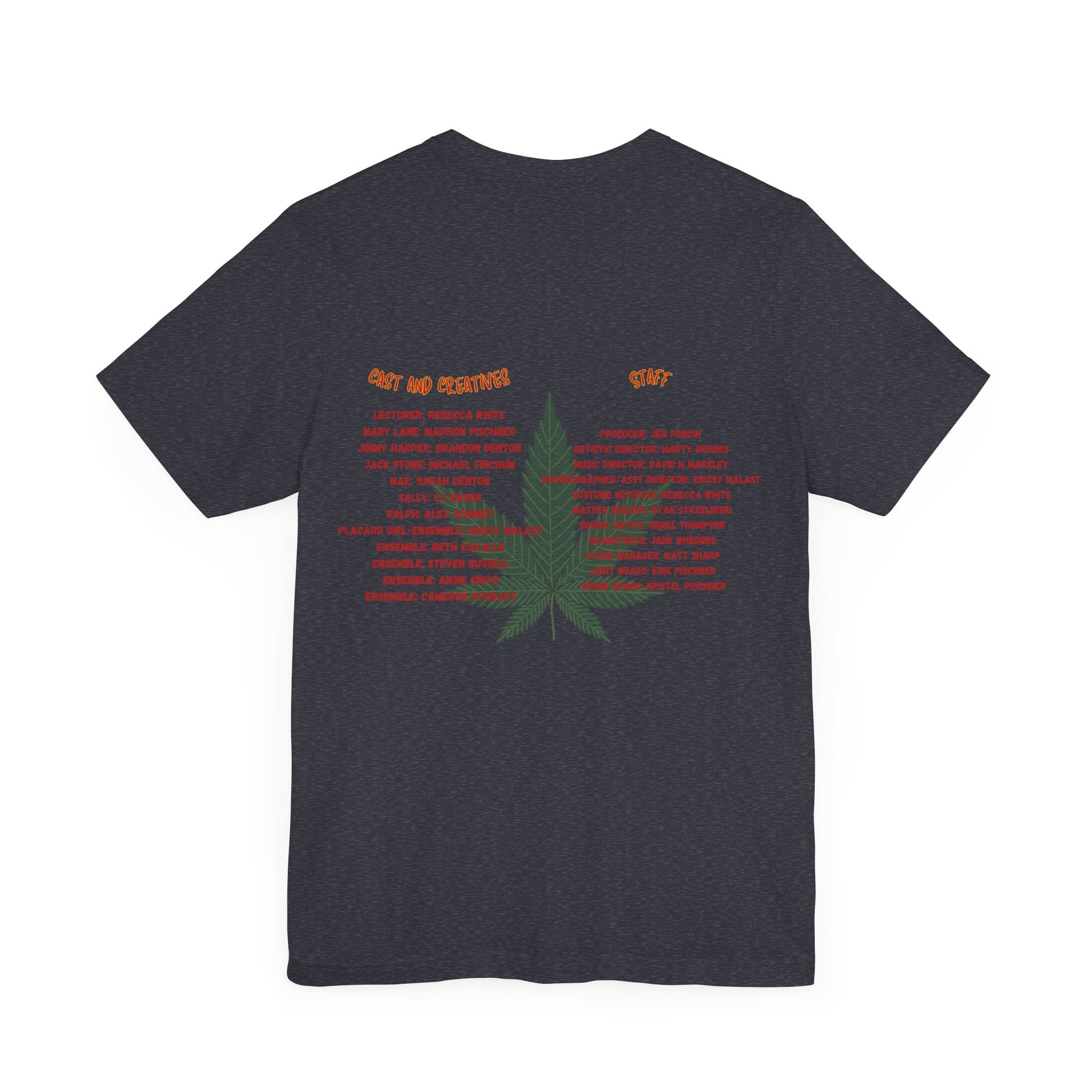 The Miller Community Theatre - Reefer Madness Cast and Crew Shirt by Printify showcases a vibrant design featuring bold, colorful text that reads "Reefer Madness The Musical" with a cartoon joint illustration. Below the main text, "A Miller Community Theatre Joint" is highlighted in red. This limited-edition green t-shirt, with its centered design, is perfect for cast and crew members.