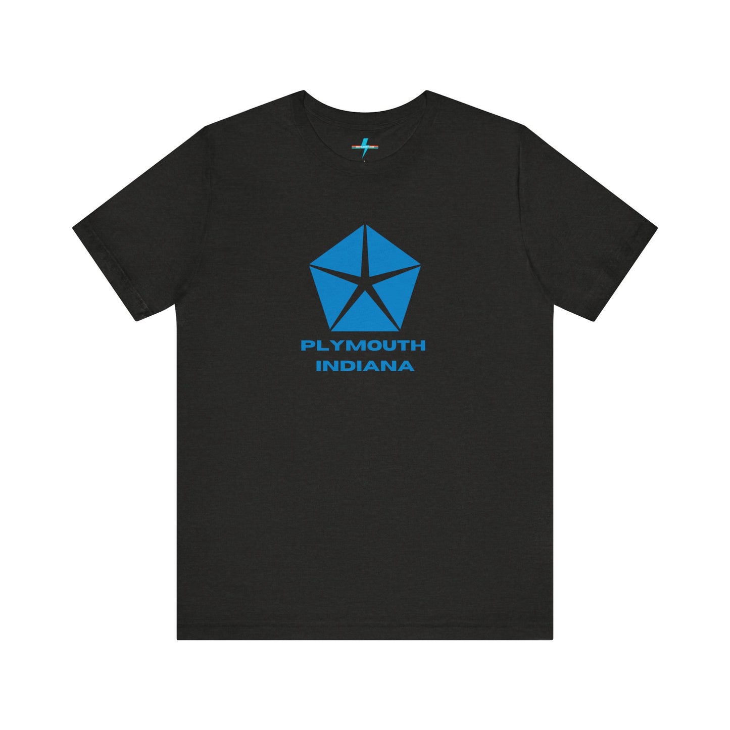 A black Printify Plymouth, Indiana Chrysler Logo T-shirt is displayed against a plain white background. The shirt features a blue, five-point star emblem reminiscent of a vintage autos design above the text "PLYMOUTH INDIANA" in blue, centered across the front. The shirt is laid out flat with the sleeves slightly bent.