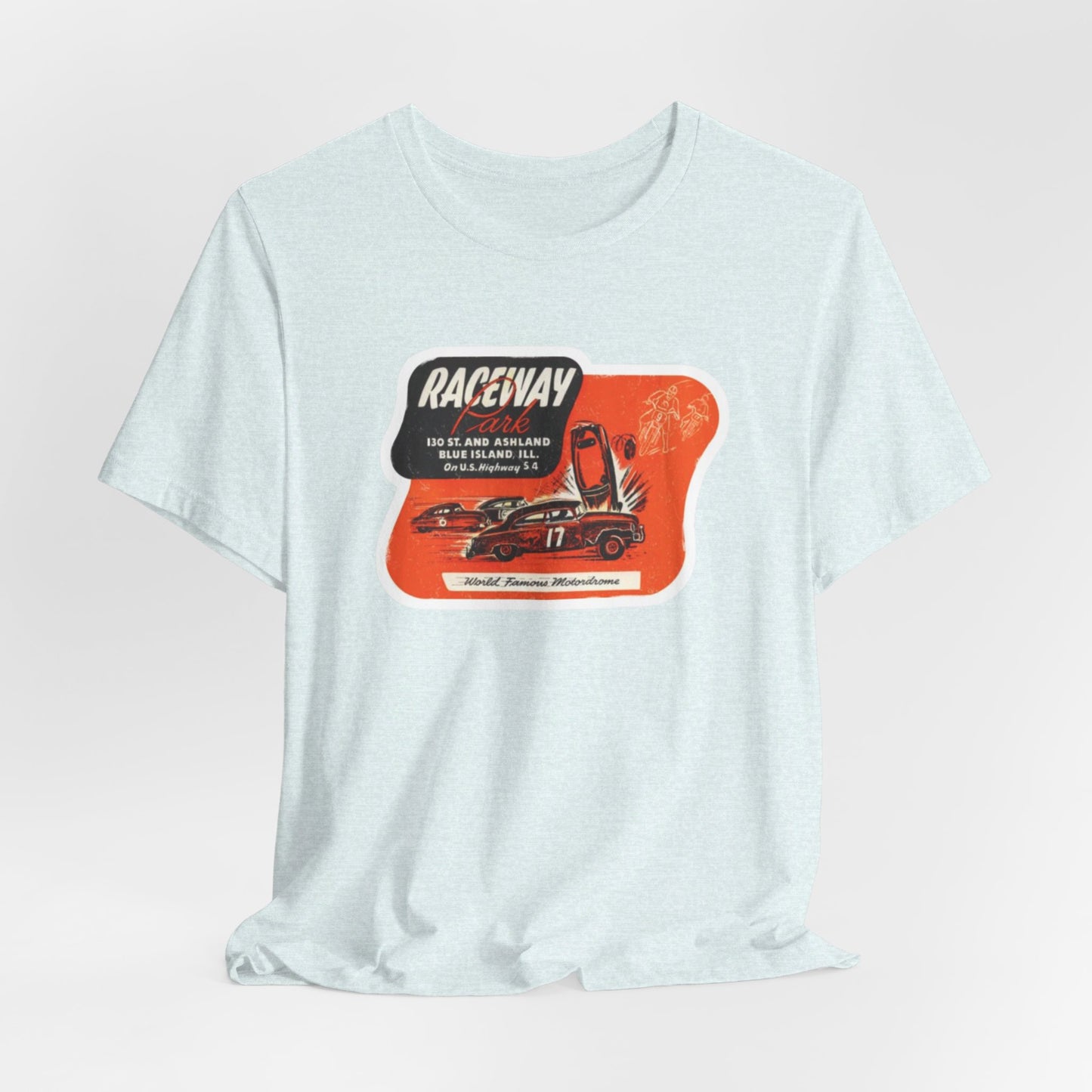 The 1970's Raceway Park - Blue Island, IL - Unisex Jersey Short Sleeve Tee by Printify is a light gray T-shirt featuring a graphic with a red background, an illustration of a race car labeled "17," and text reading "RACEWAY" and "As Seen On." The vintage-inspired design offers a nostalgic nod to classic car enthusiasts, reminiscent of the '70s racing era. The shirt is displayed against a plain background.