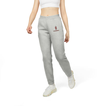 Gray Printify adidas fleece joggers with elastic waistband and cuffs, featuring the iconic Adidas logo on the upper left thigh and an "Oldsmobile - 1970s Logo" design on the right. Made with recycled polyester, they support the Better Cotton Initiative for a more sustainable future.