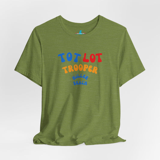 A green unisex jersey short sleeve tee from Printify, featuring colorful text on the front that reads "TOT LOT TROOPER MILLER BEACH" in blue, red, yellow, and orange letters. The shirt is displayed against a plain white background.