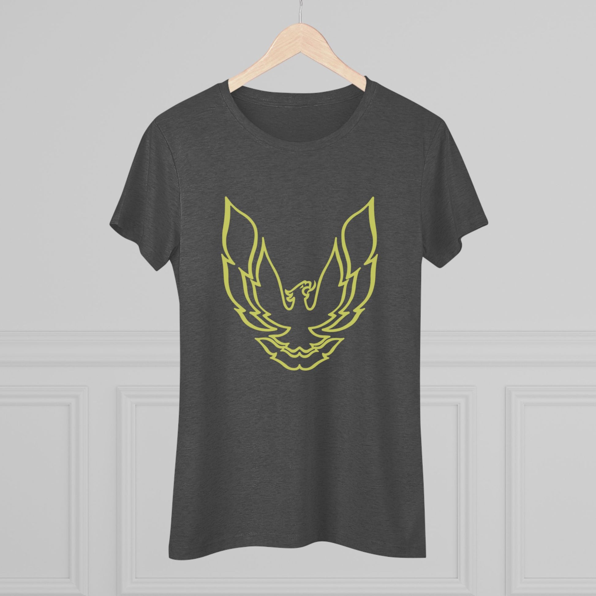 A retro 1970's-inspired red women's triblend tee by Printify, featuring a stylish gold phoenix design on the front. The vibrant, sleek graphic depicts the iconic Trans Am bird with its wings spread upward, giving this cozy t-shirt a bold and dynamic look.