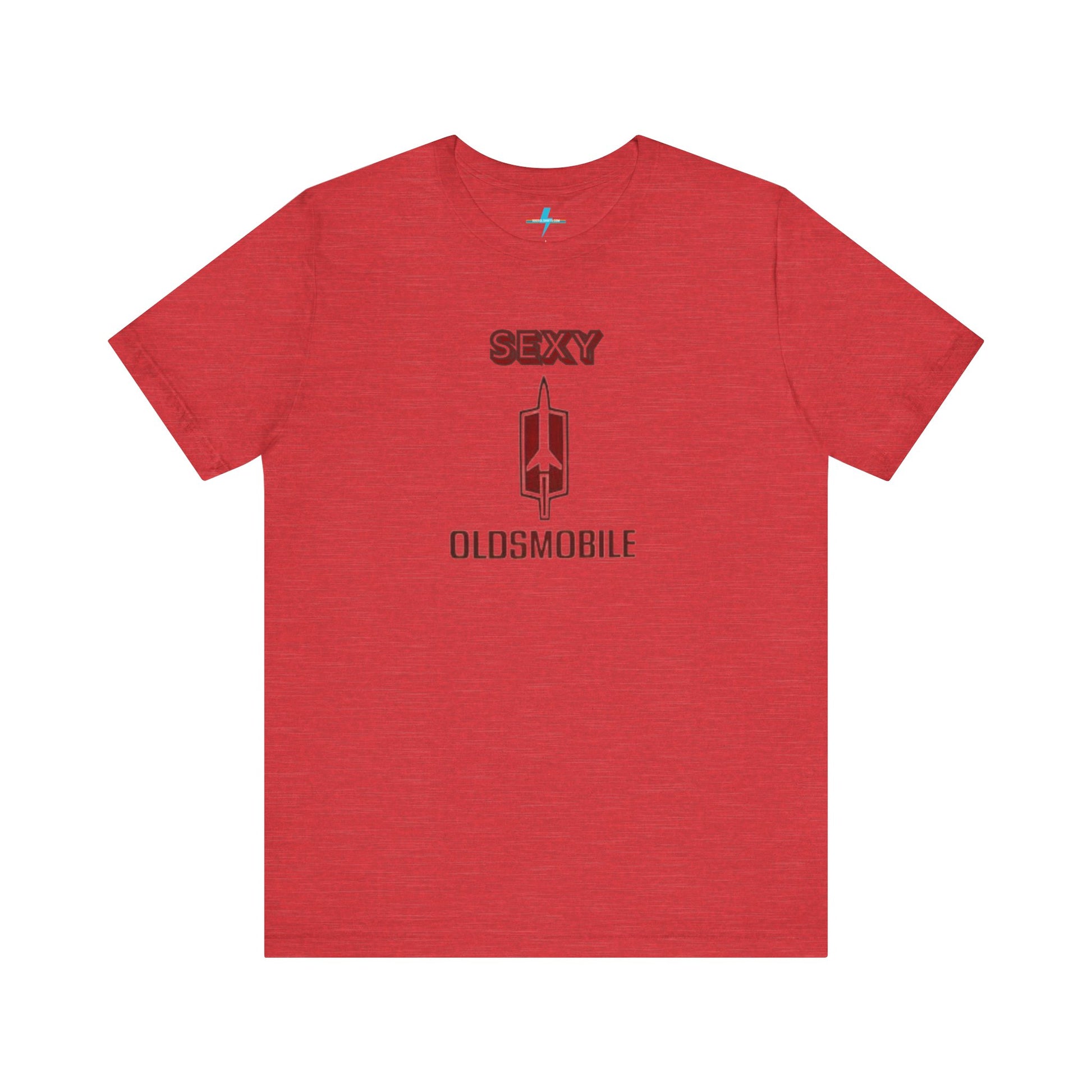 Introducing the Sexy Oldsmobile - Unisex Jersey Short Sleeve Tee by Printify, a light gray t-shirt featuring a striking graphic in the center. The design includes the word "SEXY" in bold red letters above a vertical Oldsmobile logo, underlined by the word "OLDSMOBILE" in red letters. This t-shirt is perfect for vintage car enthusiasts and comedy lovers alike, with its plain white background accentuating the bold design.