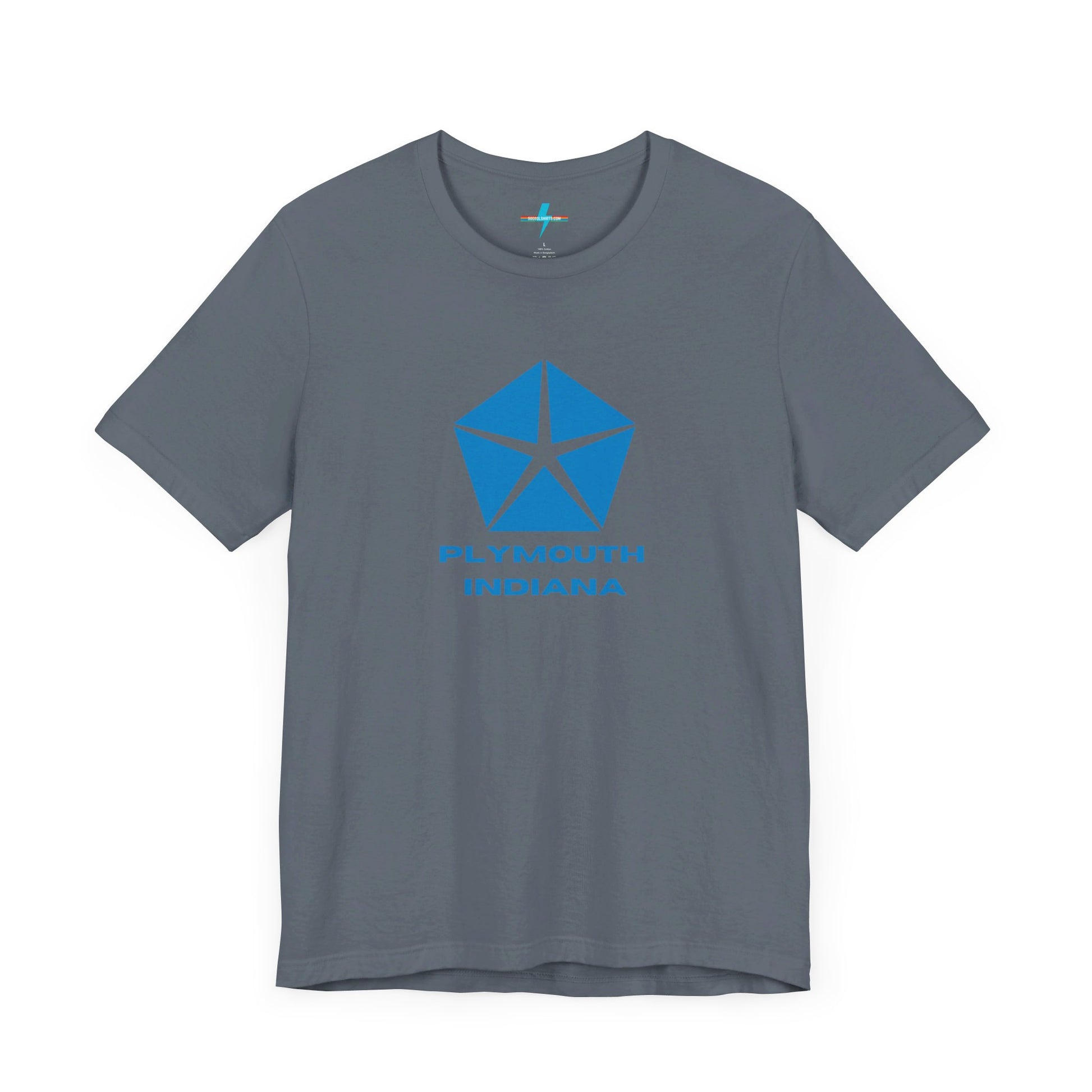 A black Printify Plymouth, Indiana Chrysler Logo T-shirt is displayed against a plain white background. The shirt features a blue, five-point star emblem reminiscent of a vintage autos design above the text "PLYMOUTH INDIANA" in blue, centered across the front. The shirt is laid out flat with the sleeves slightly bent.