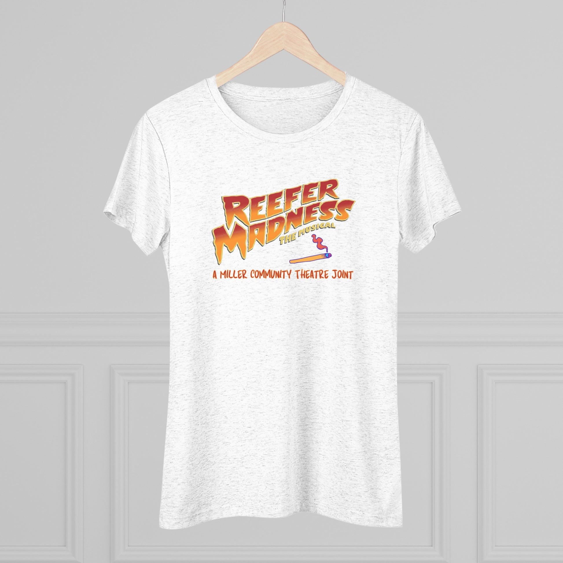 This limited-edition dark gray "Reefer Madness Cast Shirt - Miller Community Theatre - Women's Triblend Tee" by Printify features the text "Reefer Madness: The Musical" in bold, fiery letters across the chest. Below, in smaller orange text, it reads, "A Hill's Community Theatre Joint.