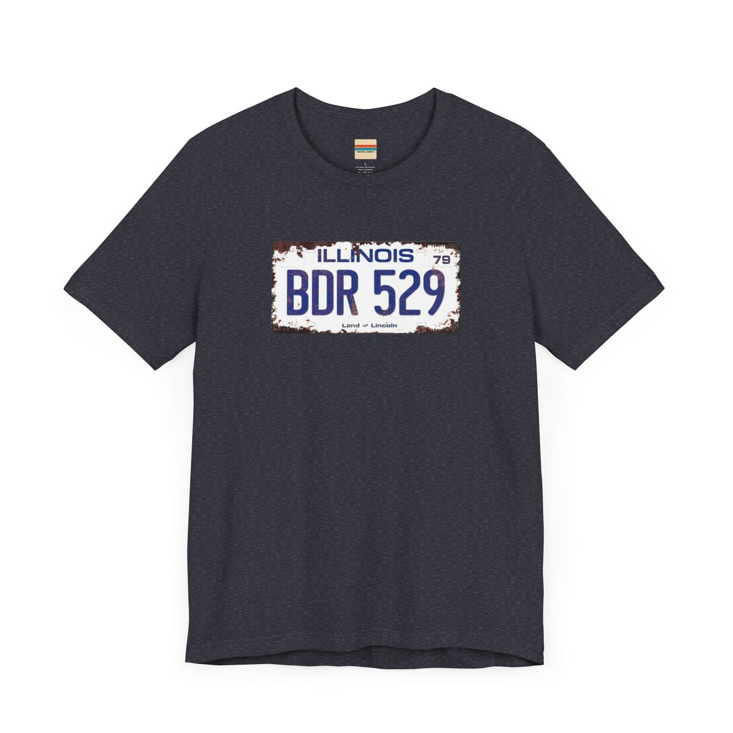 The Printify Blues Brothers BDR 529 License Plate Unisex Jersey Short Sleeve Tee showcases a vintage Illinois license plate graphic with "BDR 529" prominently displayed, as famously seen in the Blues Brothers film. The design includes "Illinois" and "Land of Lincoln" above and below the numbers, with a weathered, rustic look that enhances its retro appeal.