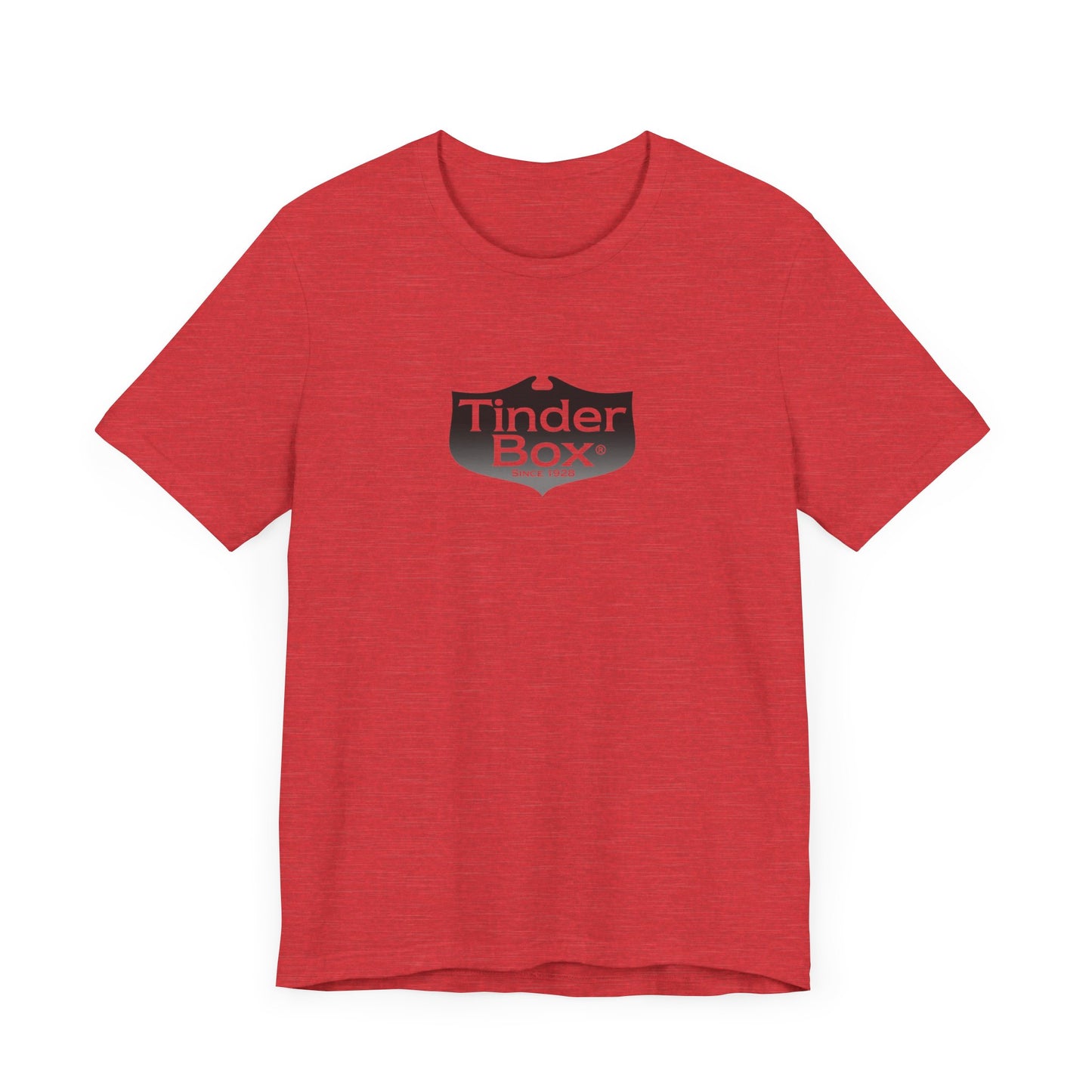 A light blue Printify "The Tinder Box 1980s" unisex jersey short sleeve tee featuring the "Tinder Box" logo in the center. The logo consists of a dark shield with the words "Tinder Box" in white text, with a small flame icon replacing the dot above the "i".