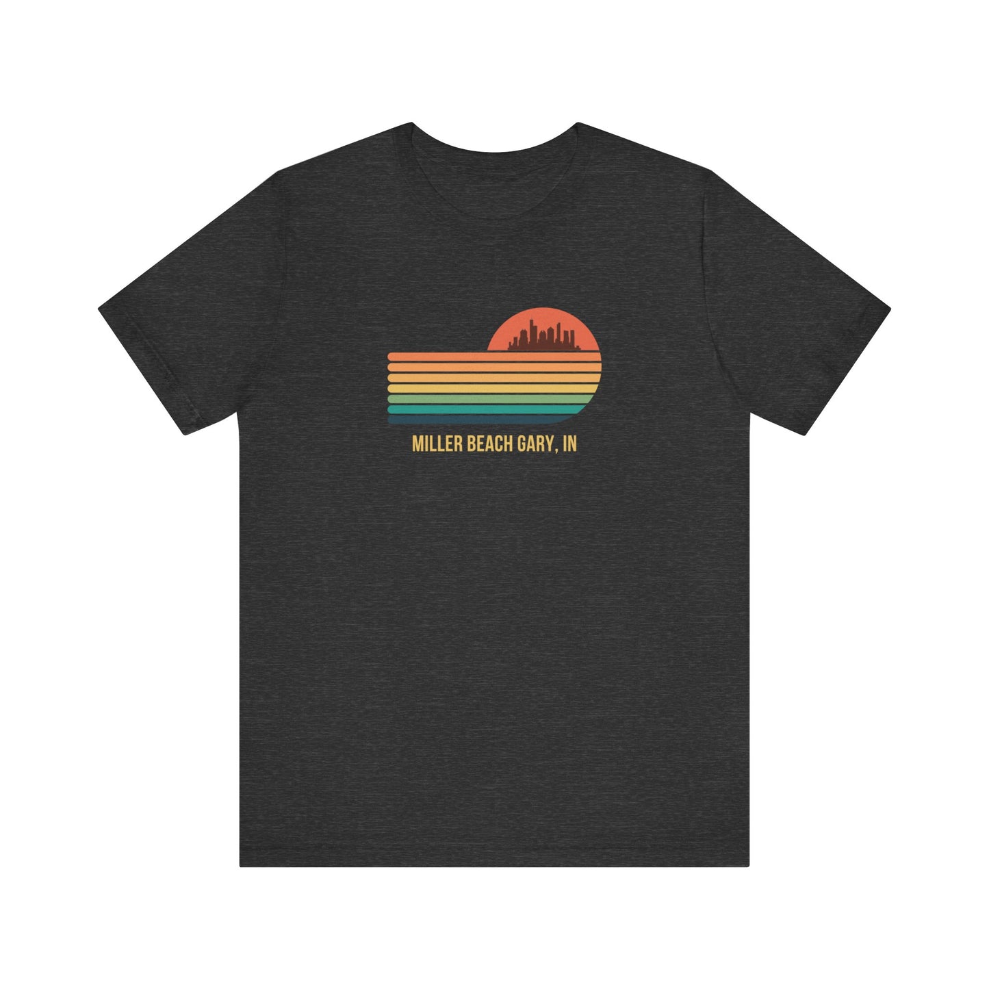 Introducing the Miller Beach Gary, IN Sunset Gradient - Unisex Jersey Short Sleeve Tee by Printify. This stylish blue T-shirt features a circular sunset graphic on the chest, showcasing a black city skyline silhouette against an orange-red sunset with horizontal stripes in green, yellow, and orange. Below the graphic reads "MILLER BEACH GARY, IN." Crafted from soft cotton for extra beachy charm.